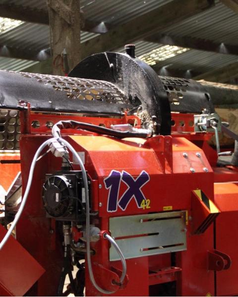 The wood is transferred from the log deck onto the processor 